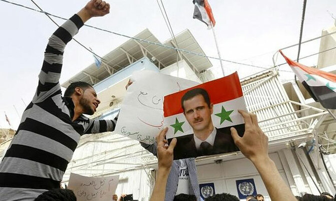 Hundreds in Syria capital protest US strike Hundreds in Syria capital protest US strike