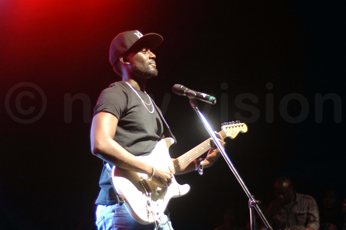 aurice irya strums the guitar during his performance hoto by enis ibele