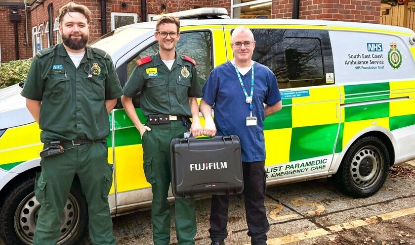 Paramedics with the carry case containing part of the mobile X-ray kit © South East Coast Ambulance Service NHS Foundation Trust