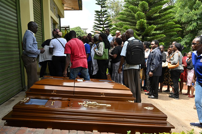 elatives stand next to empty coffins at the hiromo mortuary in airobi  hoto