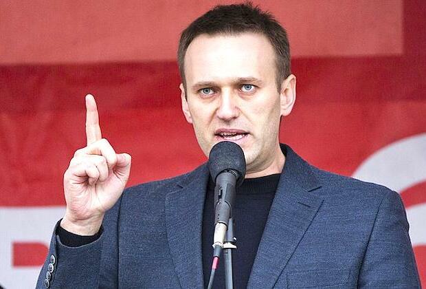 Russia hits Navalny with new charge, threat of more prison time