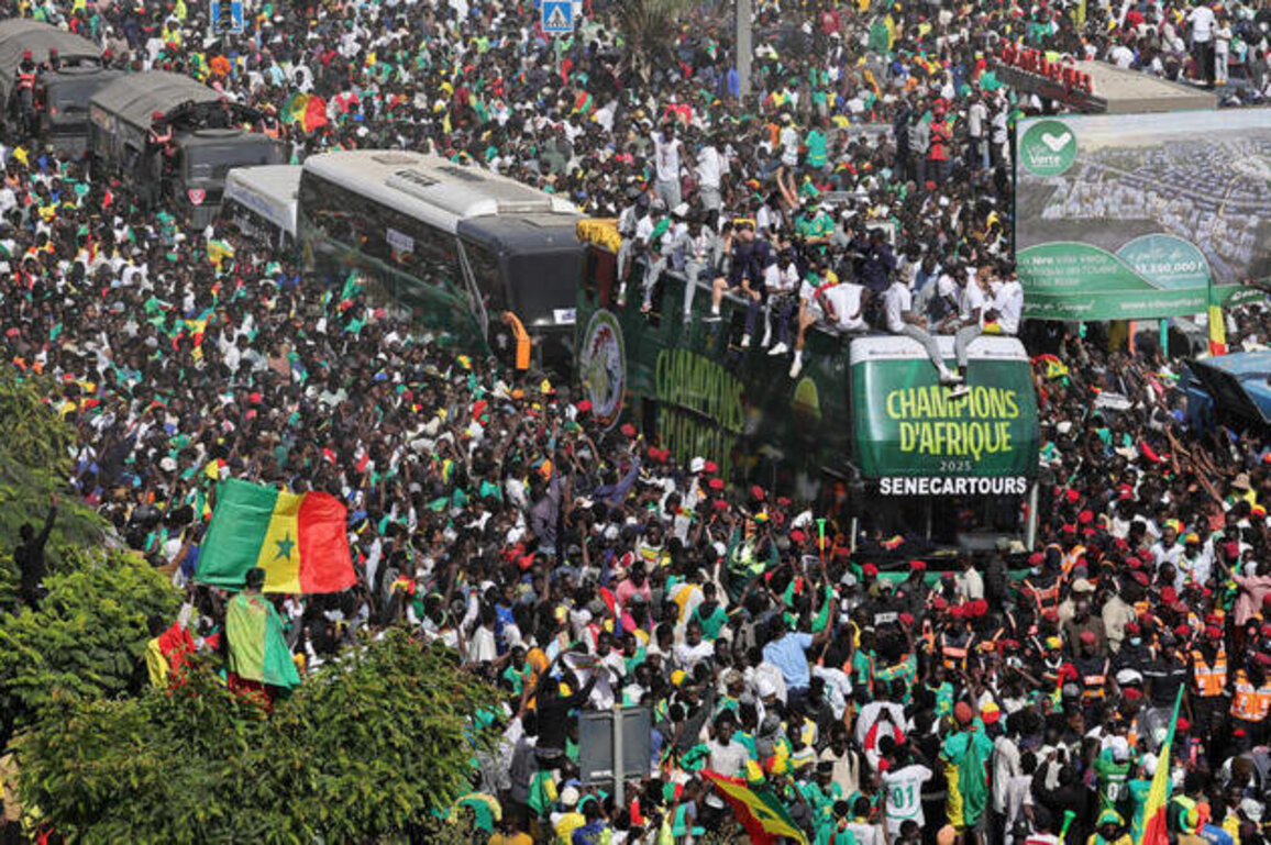 Fans flood Dakar streets for Senegals jubilant AFCON victory parade