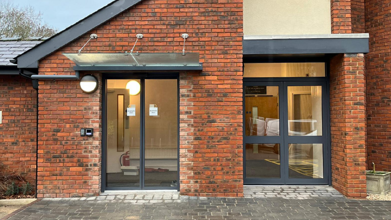 The new automatic doors and the new fire escape doors