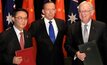 China's President signs a free trade agreement with former PM Tony Abbott and former trades minister Andrew Robb in 2006.