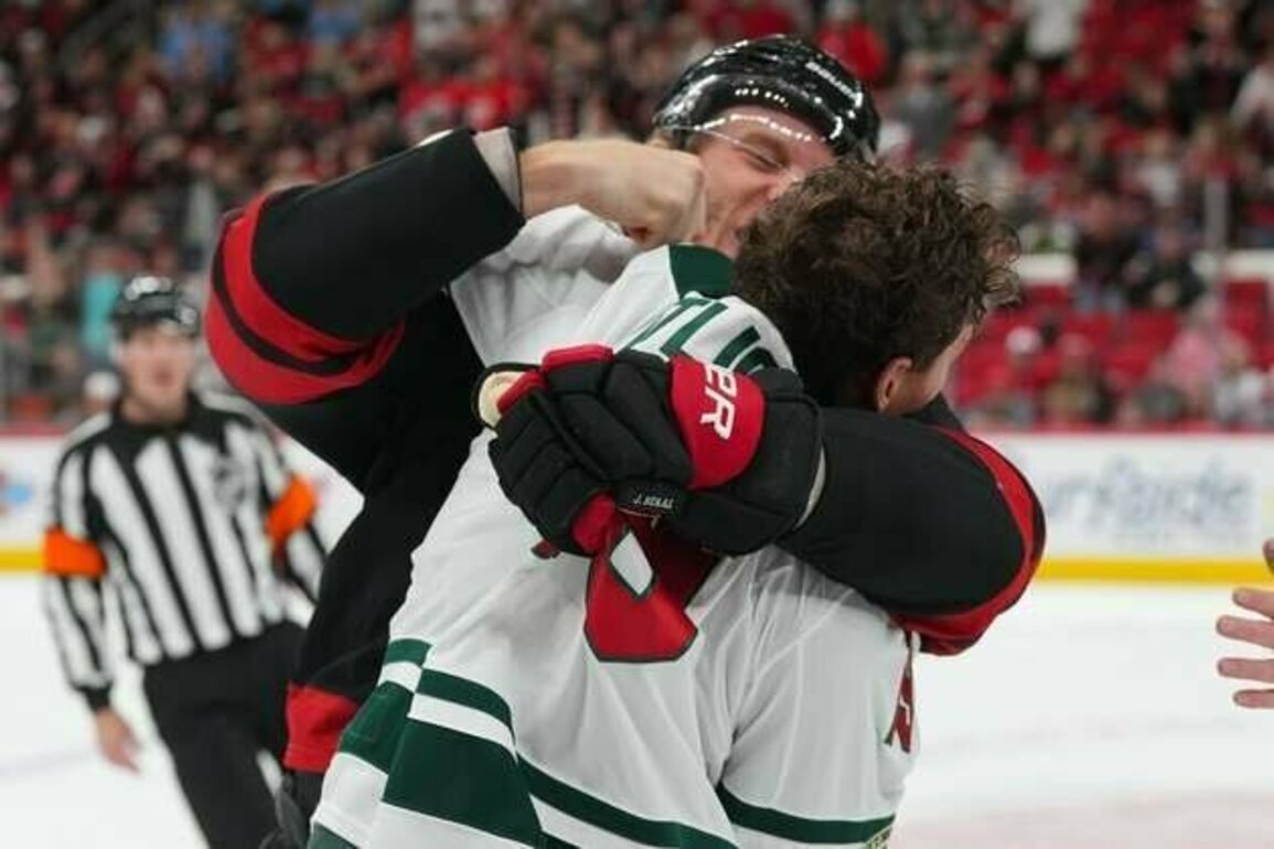 After early goal explosion, Hurricanes hold off Wild