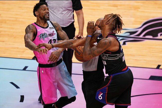 Heat never challenged, keep 76ers from clinching top seed