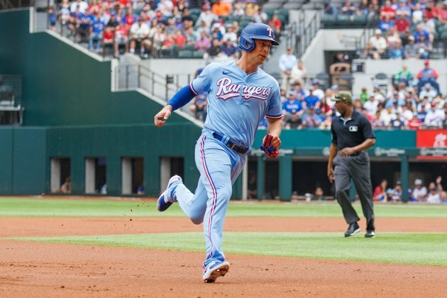 Rangers flex muscles in 13-3 rout to sweep Rockies