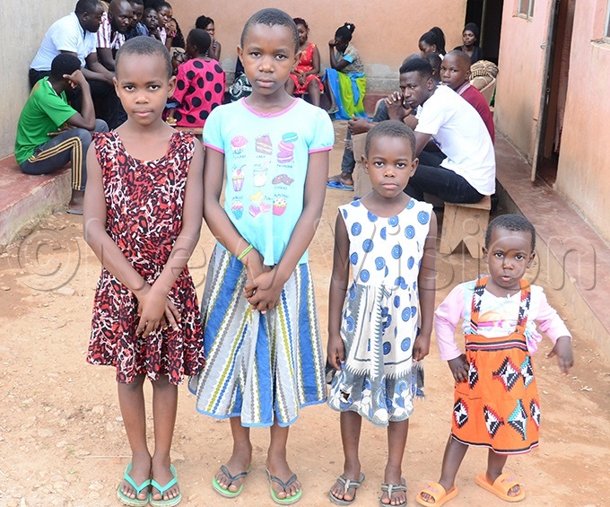  hilldren of the late obert ugisha behind them are some of the mourners who converged at his home located in ikookiro village in akiso district tuart iga