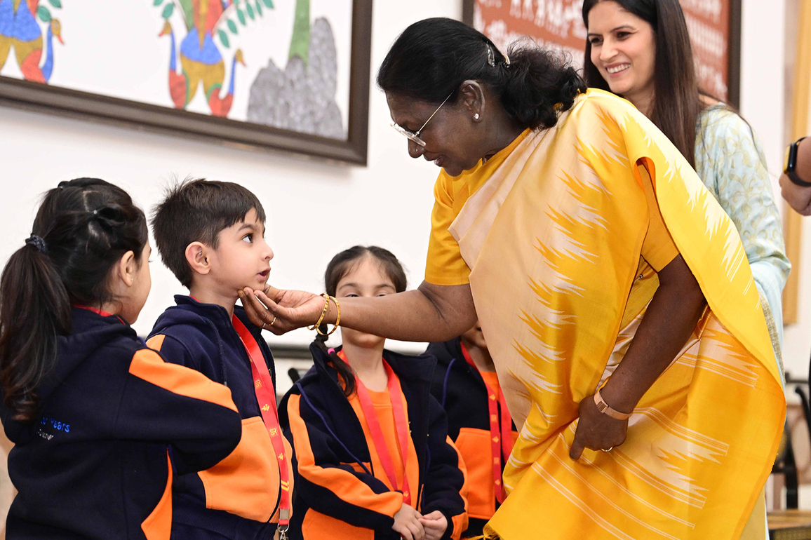 President Murmu interacts with students on Children's Day at Rashtrapati Bhavan