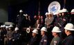  Secretary of the Department of the Interior Ryan Zinke signing two executive orders at OCT Houston 2017 surrounded by oil and gas workers.