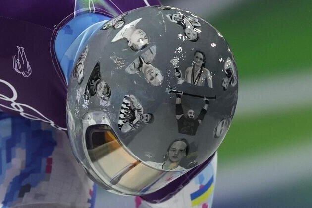 IOC 'begs' defiant Ukrainian to race without war dead helmet