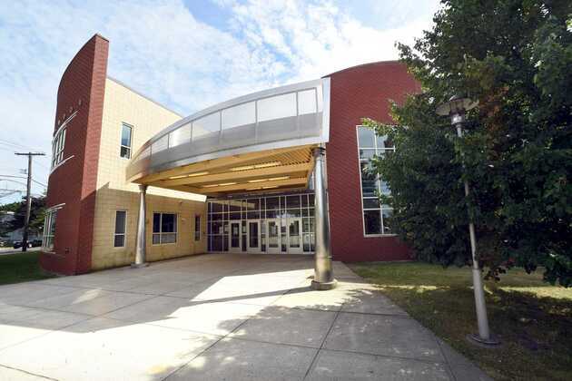ICE agents waited near a New Haven school. A father took refuge inside