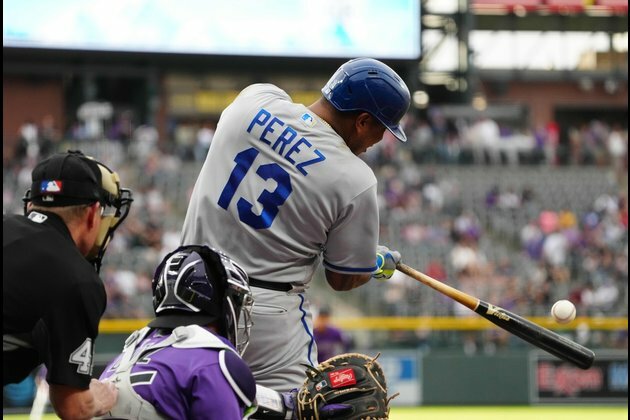 Royals pound out 18 hits in victory over Rockies