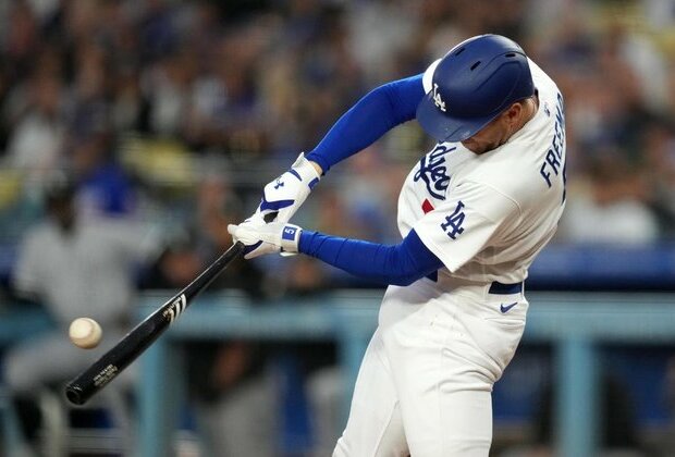 Dodgers clinch series with 11-inning win over White Sox