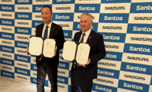 Shizuoka Gas president Yoshitake Matsumoto and Santos MD and CEO Kevin Gallagher during the signing in Japan.