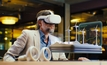 Male engineer uses VR headset, watches and checks engineering project with wind turbines in virtual reality. Talk via video call using vr app. 3D hologram. Image by Frame Stock Footage.