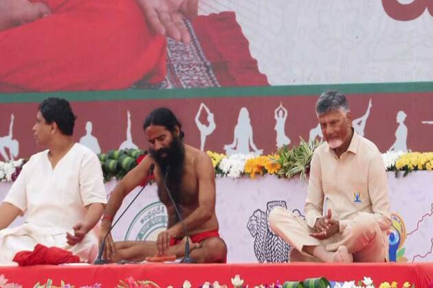 Andhra Pradesh CM Chandrababu Naidu, Baba Ramdev lead 12th International Yoga Day celebrations in Vijayawada