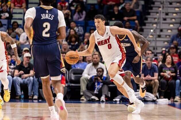 Short-handed Heat stave off rally to beat Pelicans