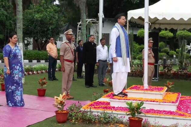 Uttarakhand CM Pushkar Singh Dhami hoists Tricolour at residence on 80th Independence Day