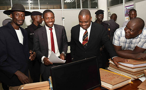 Abtex ku kkono. Lukwago ow'okubiri ku ddyo ne Bajjo ku ddyo mu kkooti Abtex ku kkono. Lukwago ow'okubiri ku ddyo ne Bajjo ku ddyo mu kkooti