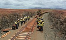 The John Holland crew laying the Eliwana rail line.