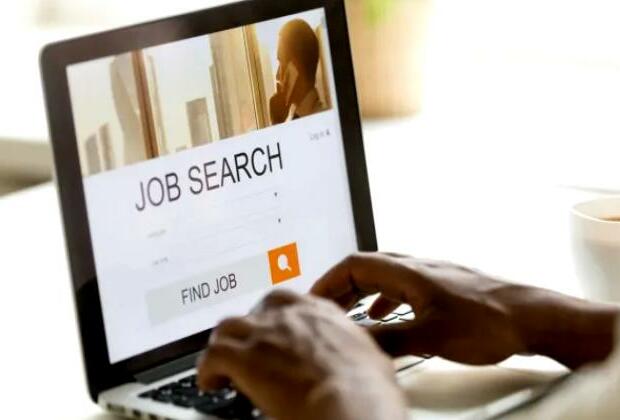 US applications for jobless benefits fall as labor market thrives