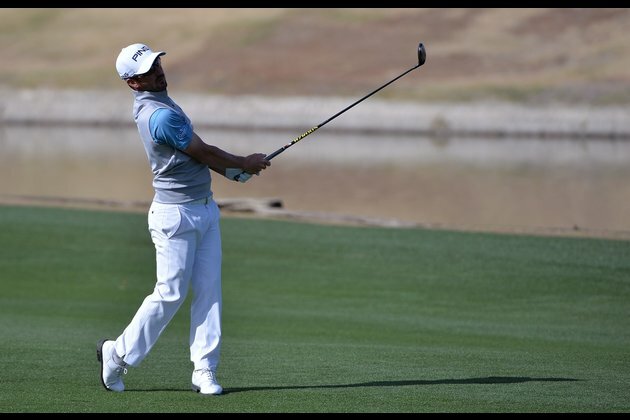 Landry holds off Ancer to win The American Express