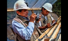  Core being examined at Minera IRL’s Ollachea gold project in Peru