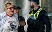  A protester is arrested at the APPEA Conference 2023.
