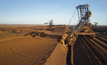 FMG profits fall on iron ore prices