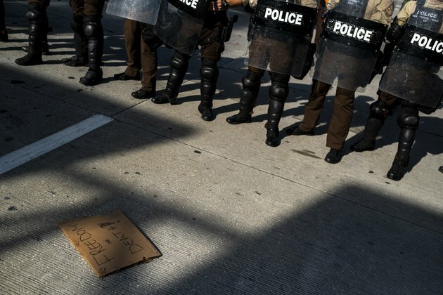 City in Florida Suspends White Officer for Shoving Black Protester