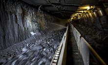 Cat longwall system with AFC full of coal.