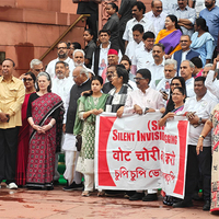 INDIA bloc MPs stage protest against SIR issue, sport '124 Not Out' T-shirts