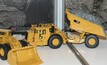 Some of the models on display at Caterpillar's Undergound Operators' Conference stand.