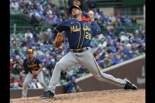 In thick of playoff hunt, Brewers meet improving Cubs