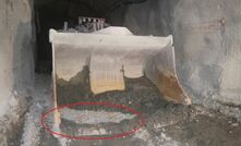 The loader involved in the incident with the likely point of impact circled in red. Photo courtesy Resources Regulator