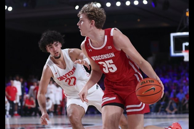 No. 3 Kansas, Wisconsin put perfect marks on line in Atlantis semis