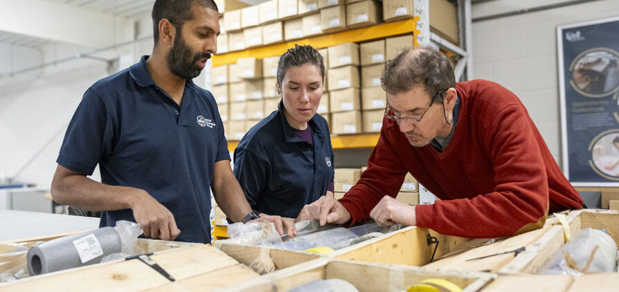 BGS geologists studying the core in the National Geological Repository