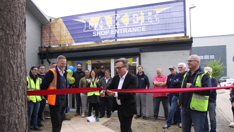 Henry Smith MP cutting the ribbon