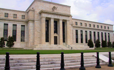 Fed signals tapering of bond buying in "tantalisingly vague" message