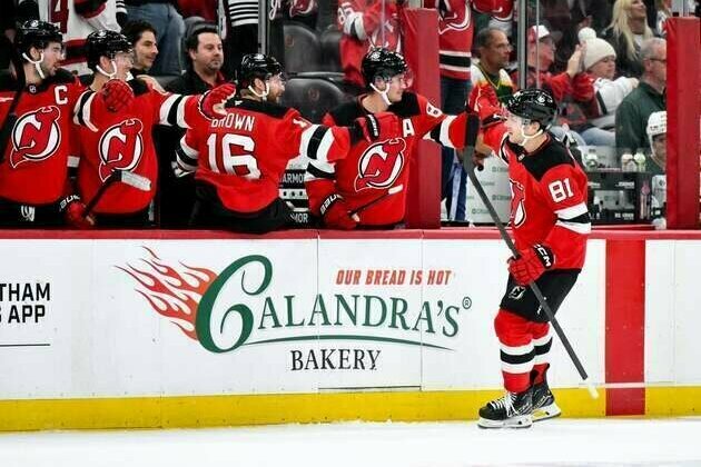 Fresh off 1st win, Sharks out to halt Devils' lengthy streak