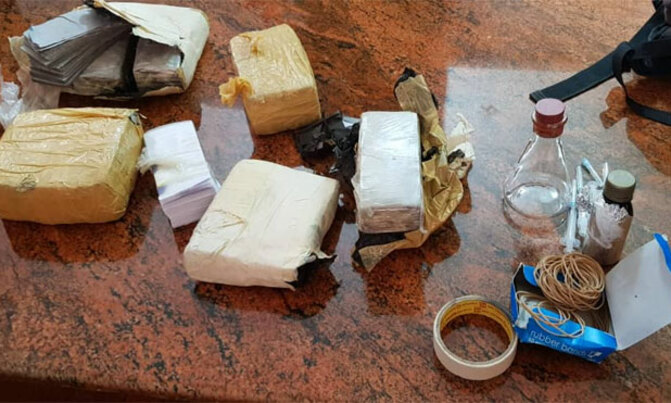 Caught with materials for making fake dollars Caught with materials for making fake dollars