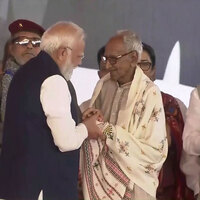 PM Modi felicitates BJP veteran worker Makhanlal Sarkar during swearing-in ceremony in Kolkata