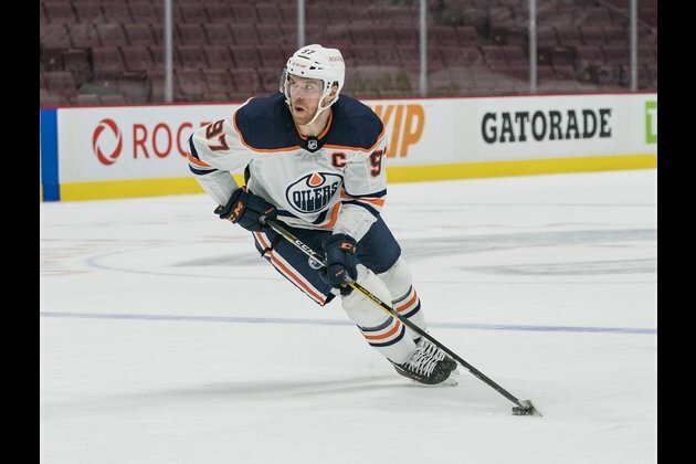 NHL roundup: Oilers, Bruins clinch playoff bids