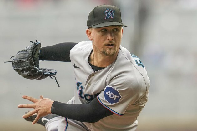 Marlins look to salvage split with Rockies in Denver