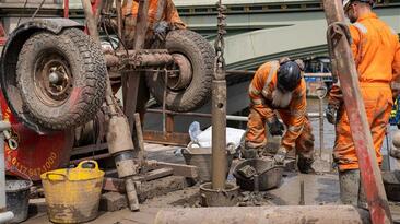 Engineers from Structural Soils conducted overwater drilling beside the Palace of Westminster using a jack-up barge on the River Thames