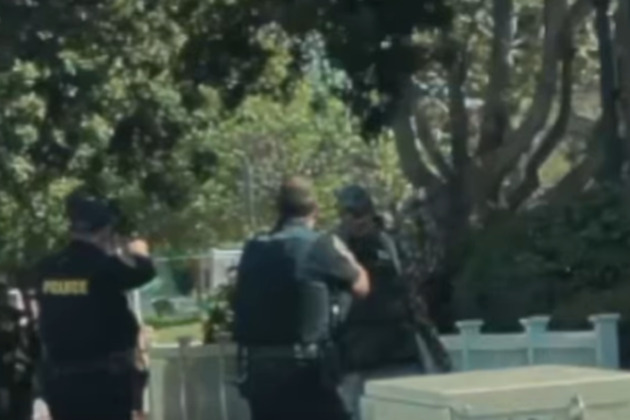 Video- Man threatens San Diego officer with axe after library rampage, leading to OIS