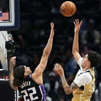 Wizards lean on productive bench, hold off skidding Kings