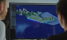  Seequent staff examine a 3D geological model