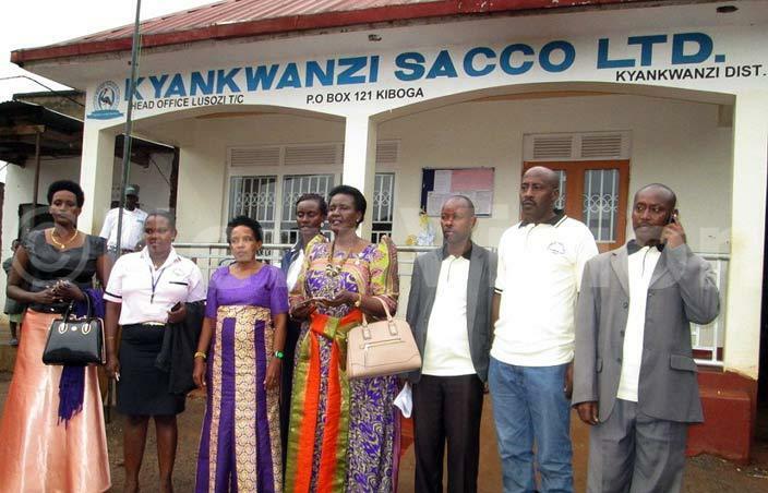  inister yambadde with board members of yankwanzi sacco   limited